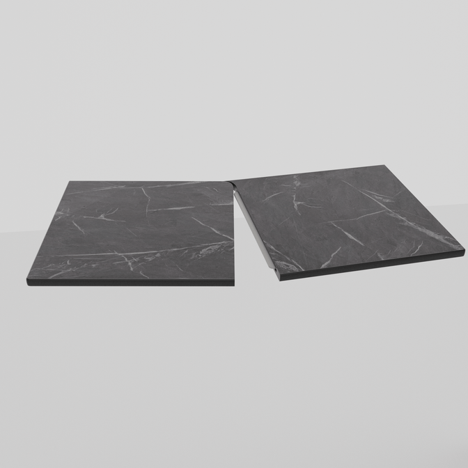 Два тёмных фрагмента столешницы из HPL компакт пластика с мраморным рисунком, соединённых еврозапилом для бесшовного стыка в кухонном интерьере.